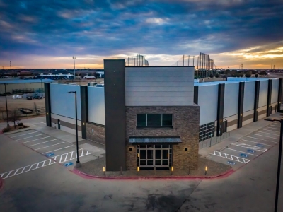 Exterior of Hillside Church at sunset, in Lubbock, Texas, with exterior commercial lighting.