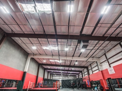 Interior of fitness club in lubbock, with commercial overhead electrical and lighting.